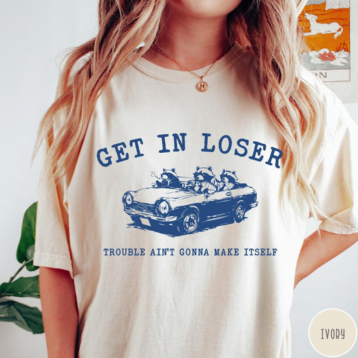 Comfort Colors tee in Ivory featuring vintage style graphic of three raccoons driving a convertible car