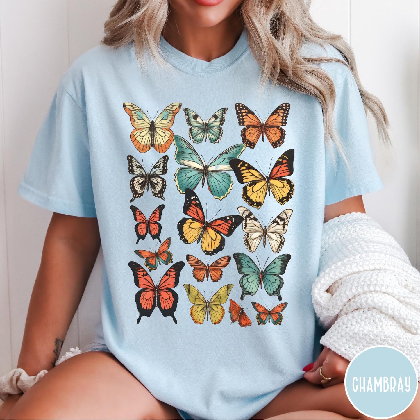 Comfort Colors tee in Chambray featuring butterfly collection design with various colorful butterfly illustrations in a grid