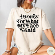 Comfort Colors tee in Ivory featuring sarcastic expression graphic with Sorry For What My Face Said text