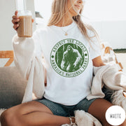 Comfort Colors tee in White featuring circular graphic design with Bigfoot and Respect the Locals text