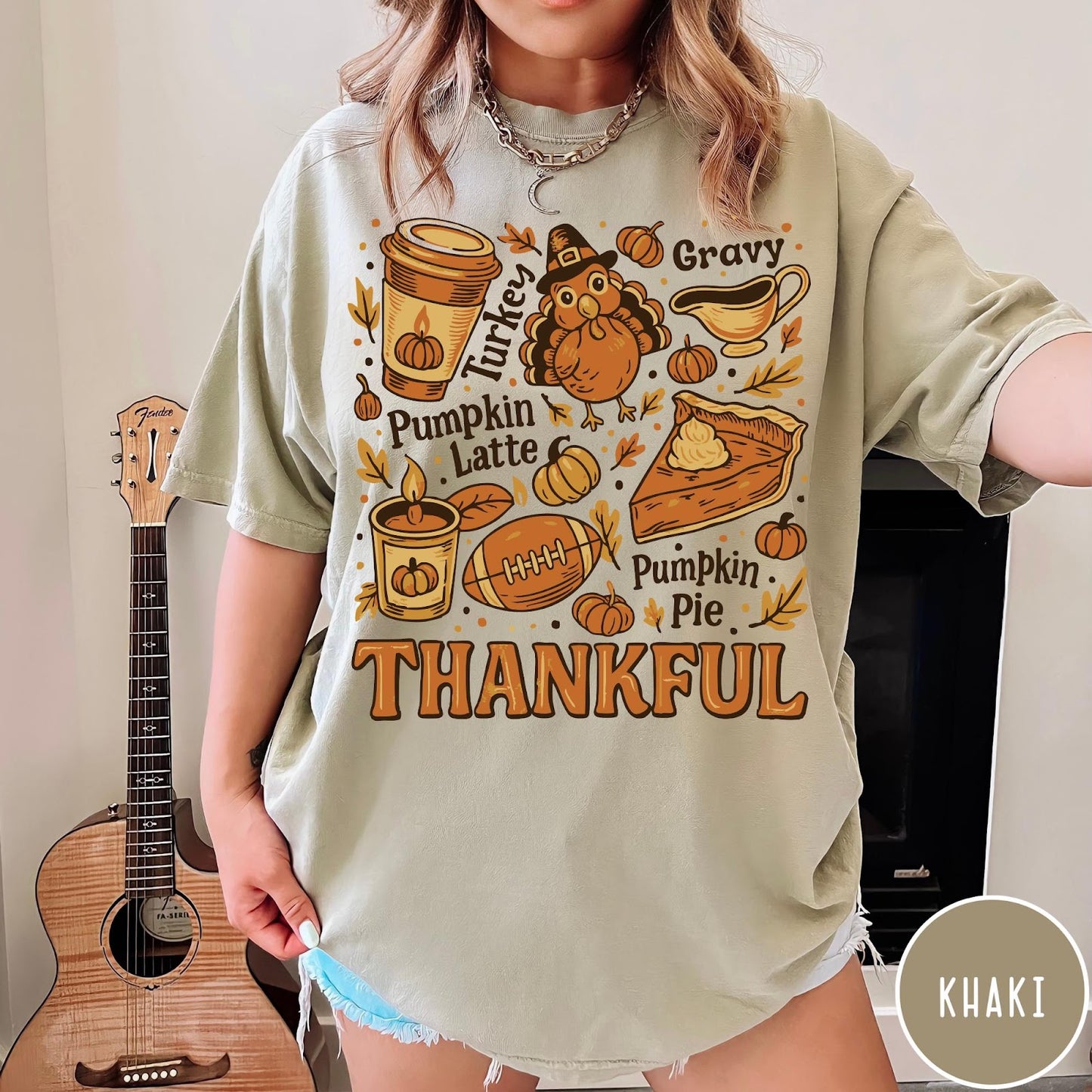 Comfort Colors tee in Khaki featuring retro Thanksgiving dinner items including turkey, pumpkin latte, and pumpkin pie graphic