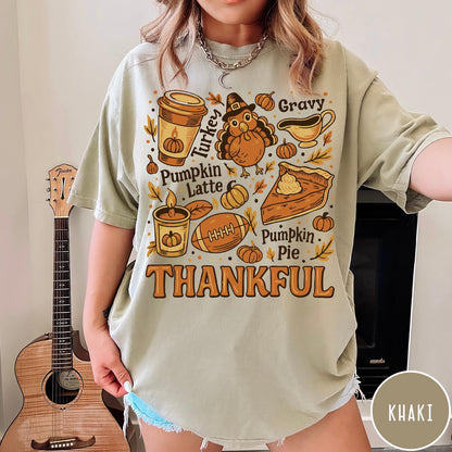 Comfort Colors tee in Khaki featuring retro Thanksgiving dinner items including turkey, pumpkin latte, and pumpkin pie graphic