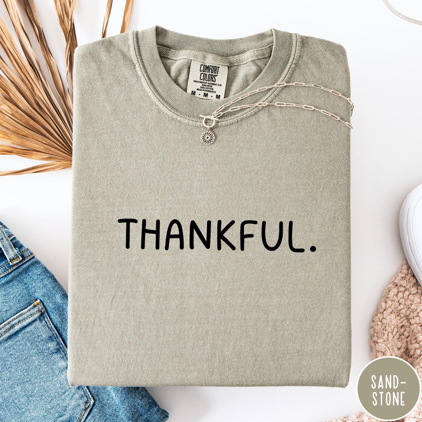Comfort Colors tee in Sandstone featuring minimalist style with the word Thankful printed in black text