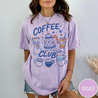 Comfort Colors tee in Orchid featuring retro graphic design with coffee pots, mugs, and iced coffee