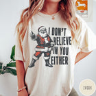 Comfort Colors tee in Ivory featuring vintage style Santa Claus graphic with text I Don't Believe In You