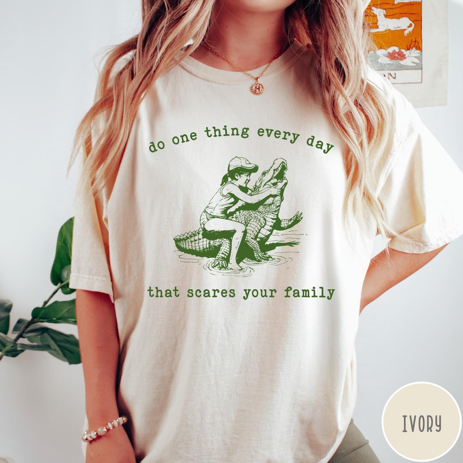Comfort Colors tee in Ivory featuring vintage style graphic of a girl wrestling an alligator