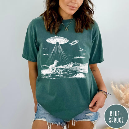 Comfort Colors tee in Blue Spruce featuring retro graphic style cat and UFO abduction scene in white ink