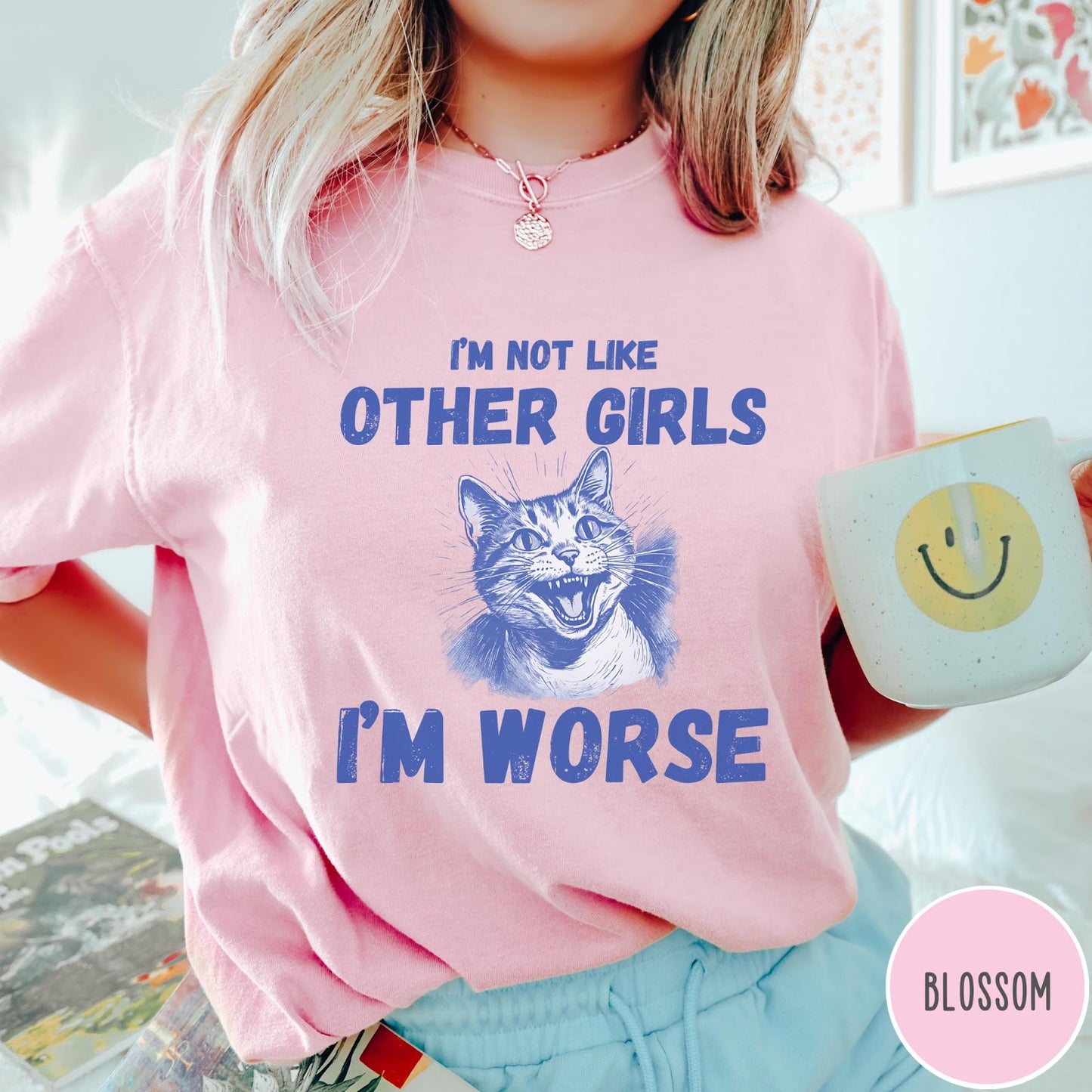 Comfort Colors tee in Blossom featuring screen printed graphic of a hissing cat and humorous text