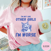 Comfort Colors tee in Blossom featuring screen printed graphic of a hissing cat and humorous text