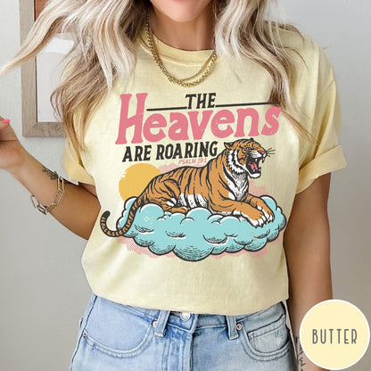 Comfort Colors tee in Butter featuring retro graphic design of a roaring tiger resting on a cloud