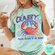 Comfort Colors tee in Island Reef featuring beachy crab graphic with bow, starfish, seashell, and coastal text