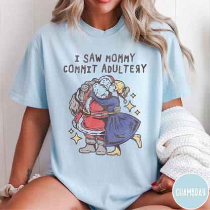 Comfort Colors tee in Chambray featuring vintage style graphic of Santa Claus kissing a woman under stars