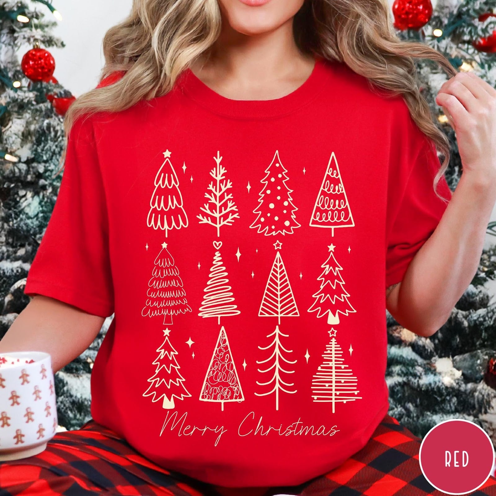 Comfort Colors tee in Red featuring festive graphic style with twelve unique illustrated Christmas tree designs