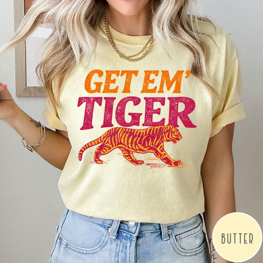 Comfort Colors tee in Butter featuring vintage style graphic with orange text and a walking tiger illustration