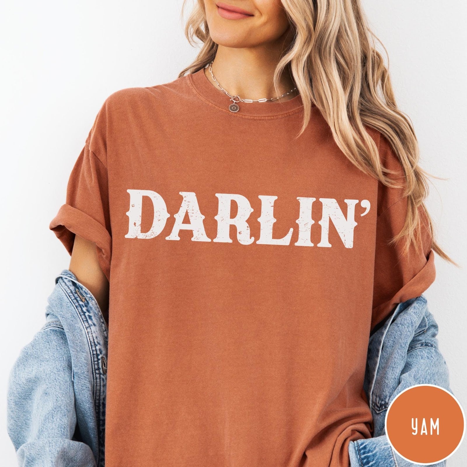Comfort Colors tee in Yam featuring western typography with the word Darlin' in a distressed white font
