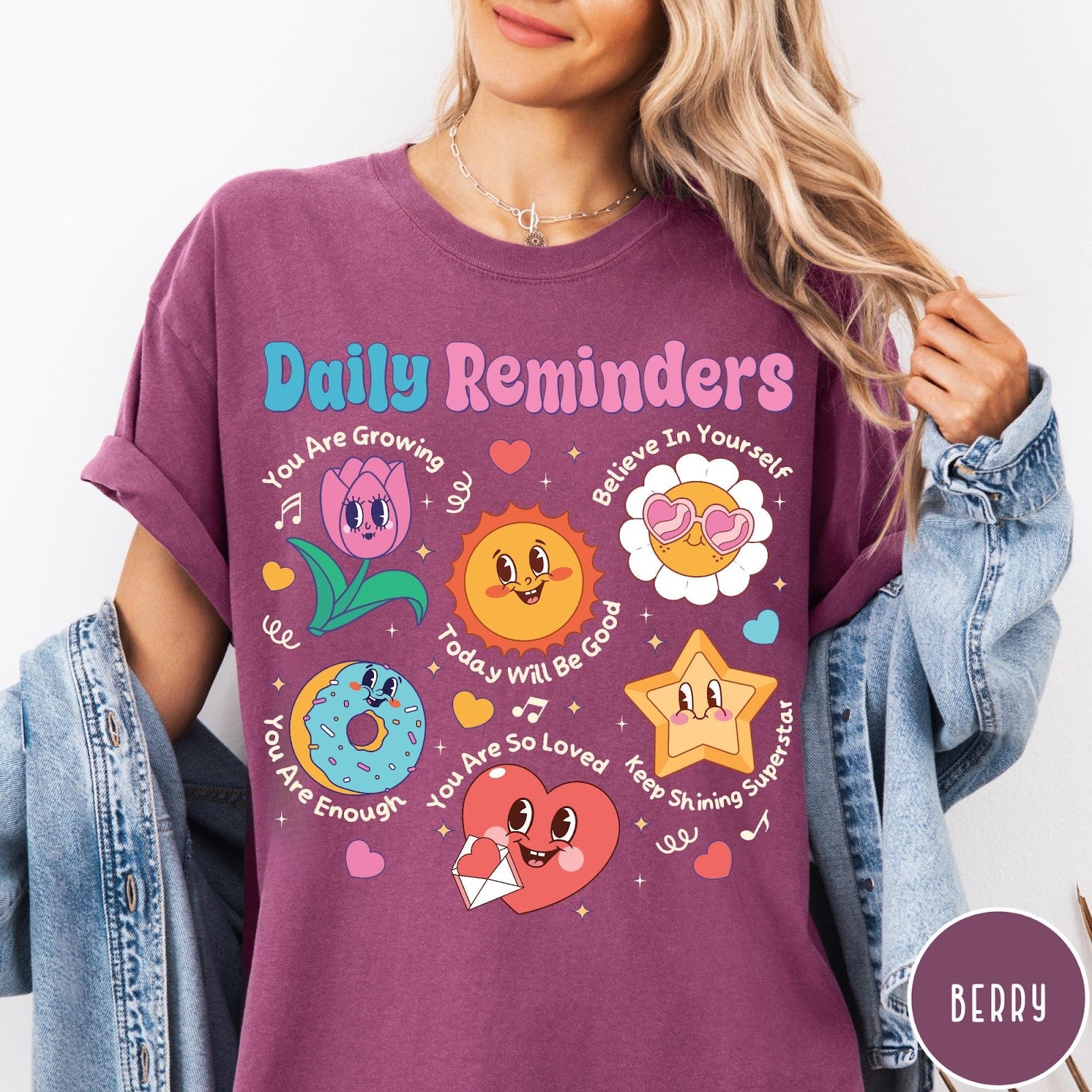 Comfort Colors tee in Berry featuring retro mascot graphic with daily affirmations and cute cartoon characters