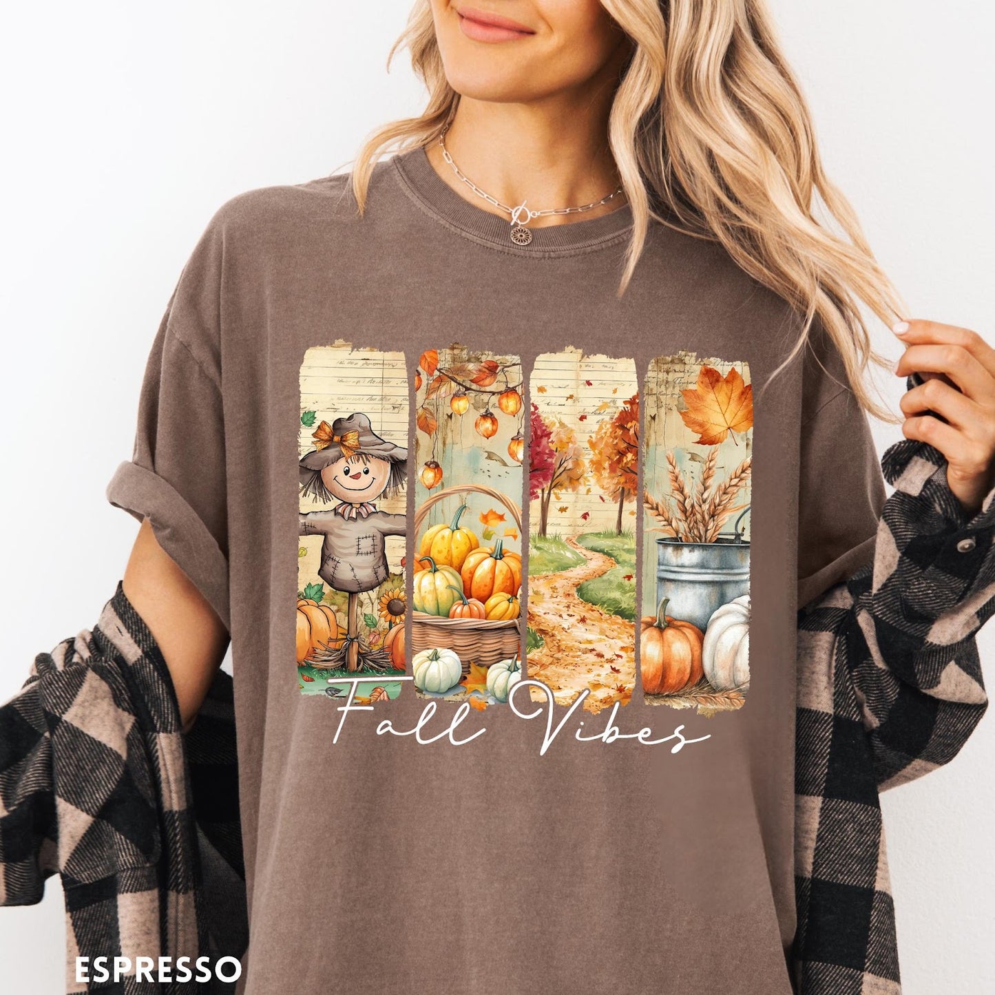 Comfort Colors tee in Espresso featuring autumn harvest graphic with a scarecrow, pumpkins, and fall foliage scenes