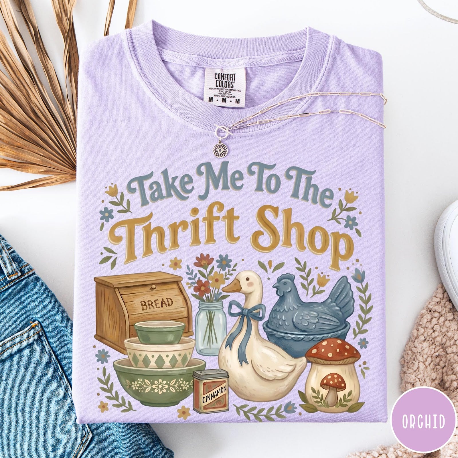Comfort Colors tee in Orchid featuring vintage kitchenware graphic with bread box, bowls, goose, and mushroom.