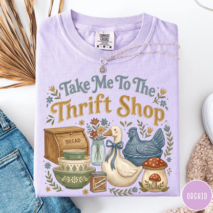 Comfort Colors tee in Orchid featuring vintage kitchenware graphic with bread box, bowls, goose, and mushroom.