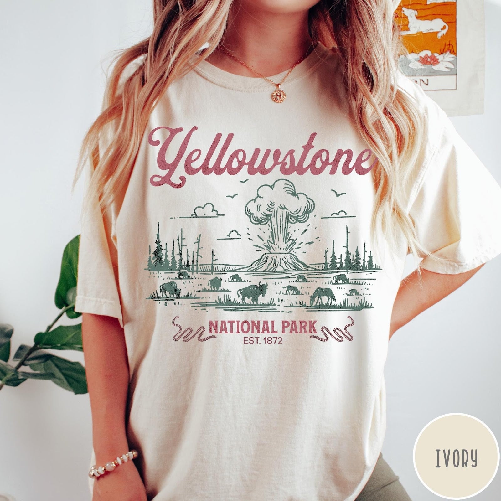 Comfort Colors tee in Ivory featuring retro graphic design of Yellowstone National Park with bison and geyser
