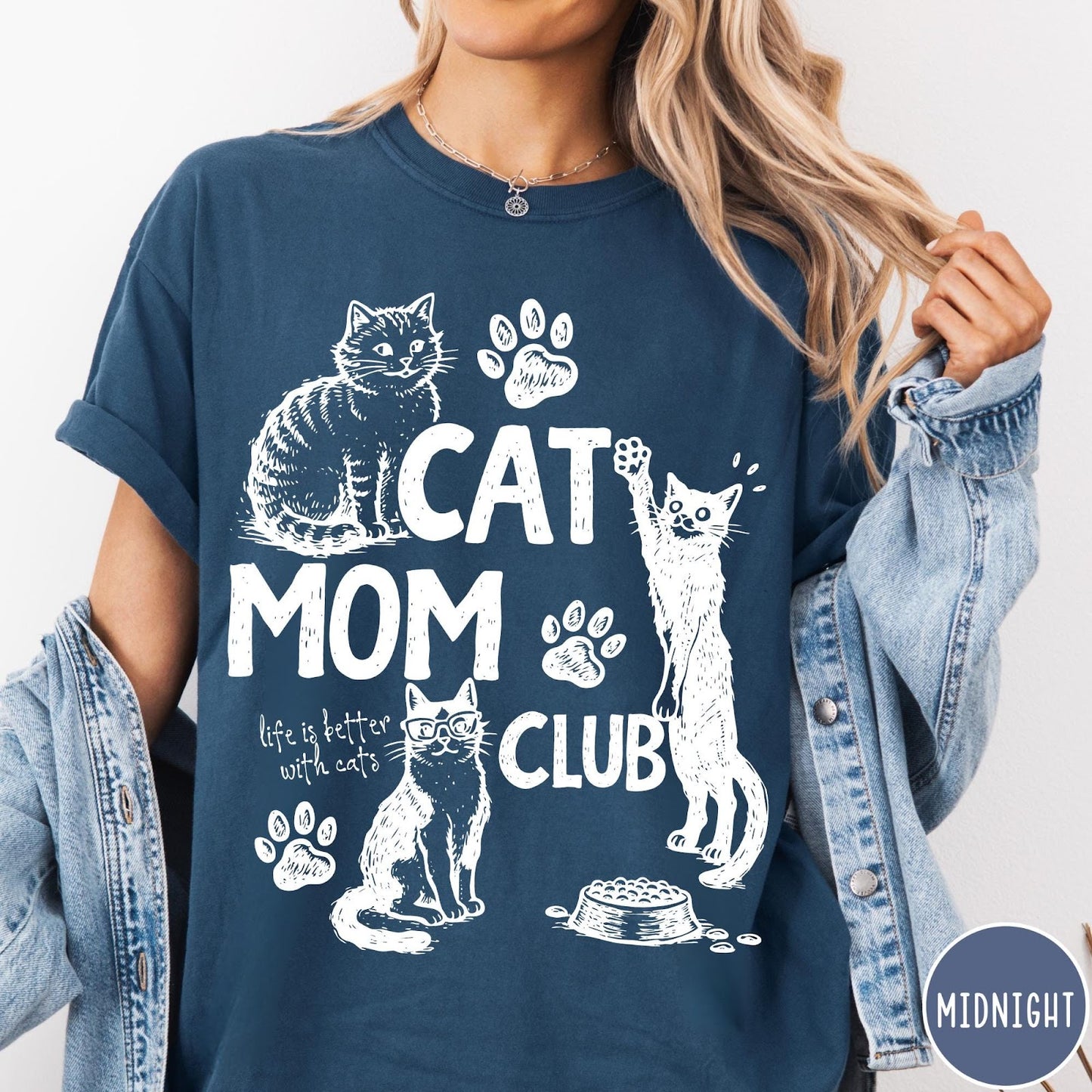 Comfort Colors tee in Midnight featuring vintage style graphic with cats, paw prints, and cat mom club text