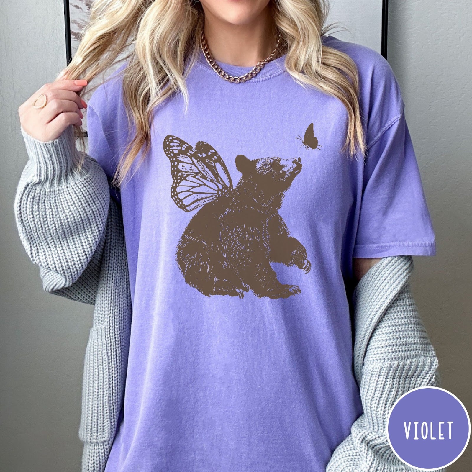 Comfort Colors tee in Violet featuring vintage style graphic of a bear with butterfly wings and butterfly