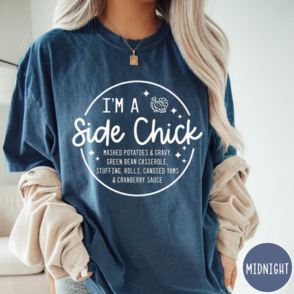 Comfort Colors tee in Midnight featuring circular Thanksgiving side dish graphic with turkey and food list