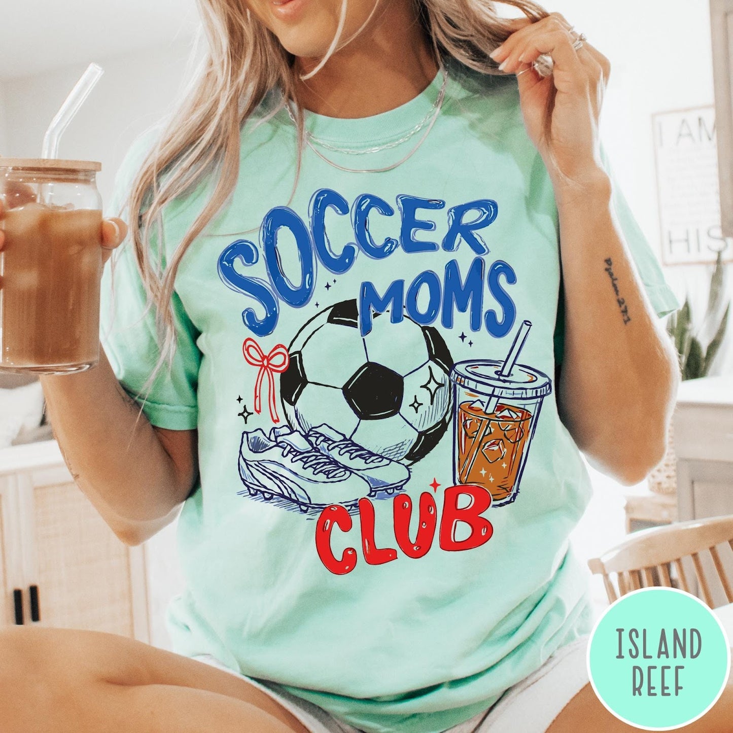 Comfort Colors tee in Island Reef featuring soccer mom lifestyle graphic with soccer ball, cleats, and iced coffee