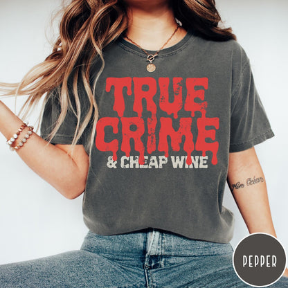 Comfort Colors tee in Pepper featuring red dripping text graphic that says True Crime and Cheap Wine