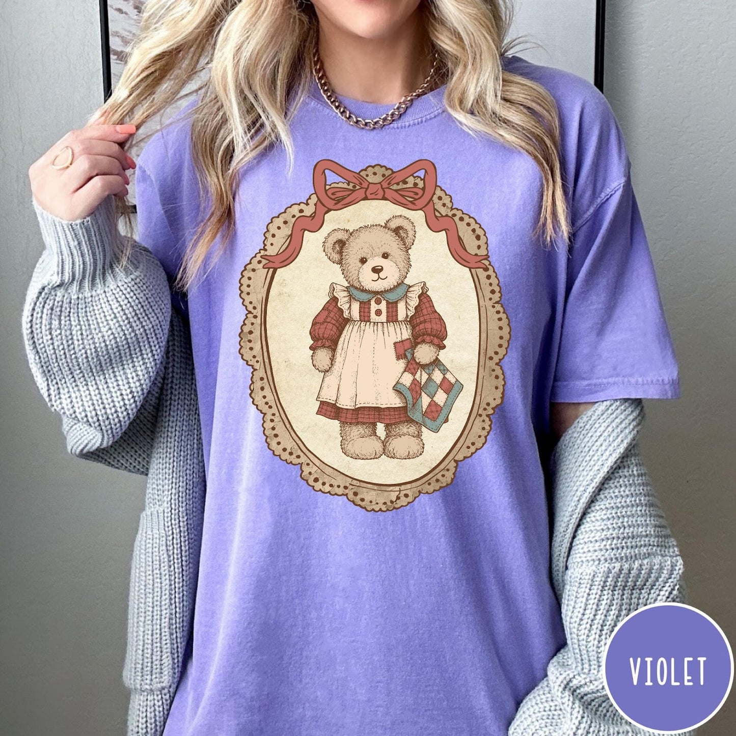 Comfort Colors tee in Violet featuring vintage style teddy bear graphic inside a decorative lace oval frame