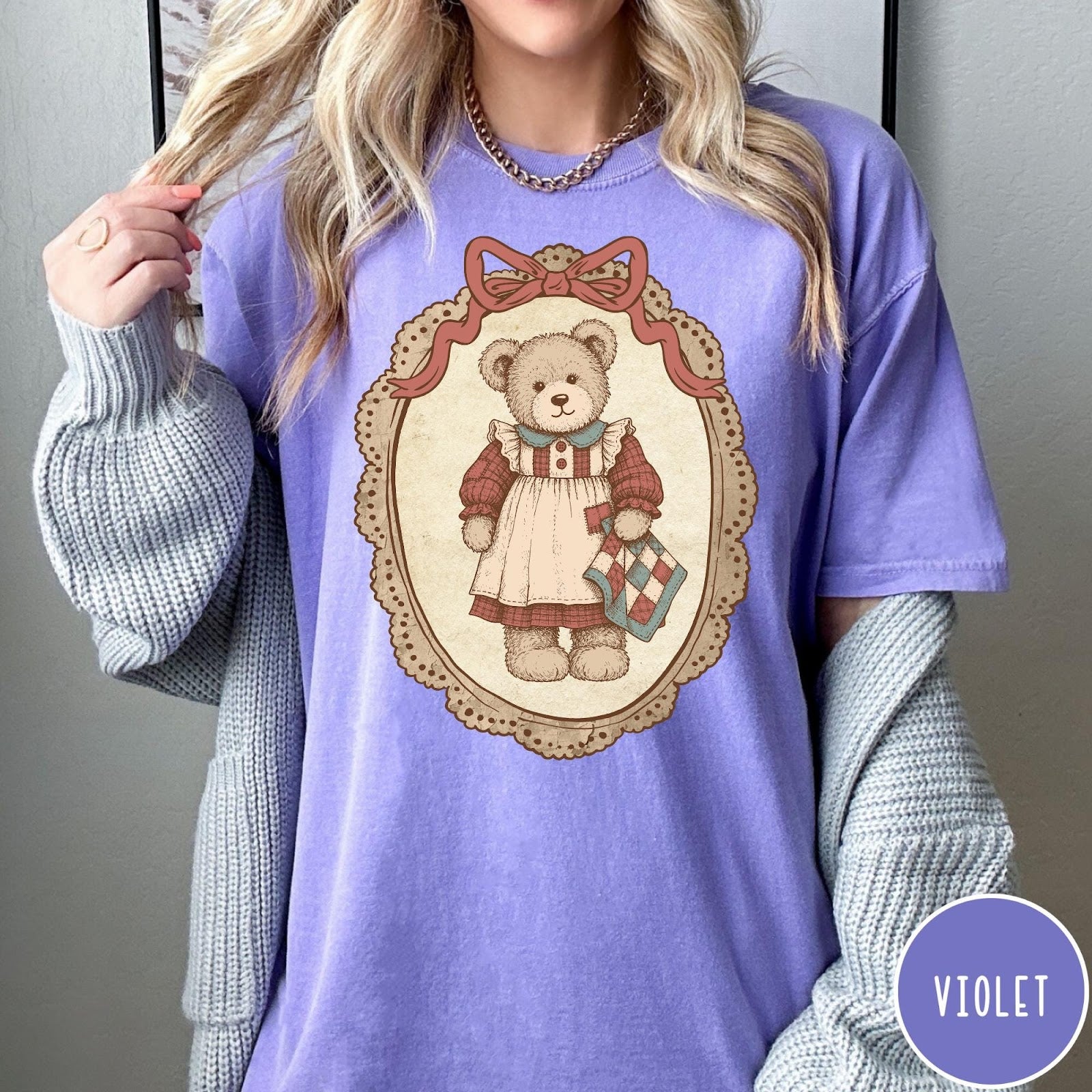 Comfort Colors tee in Violet featuring vintage style teddy bear graphic inside a decorative lace oval frame