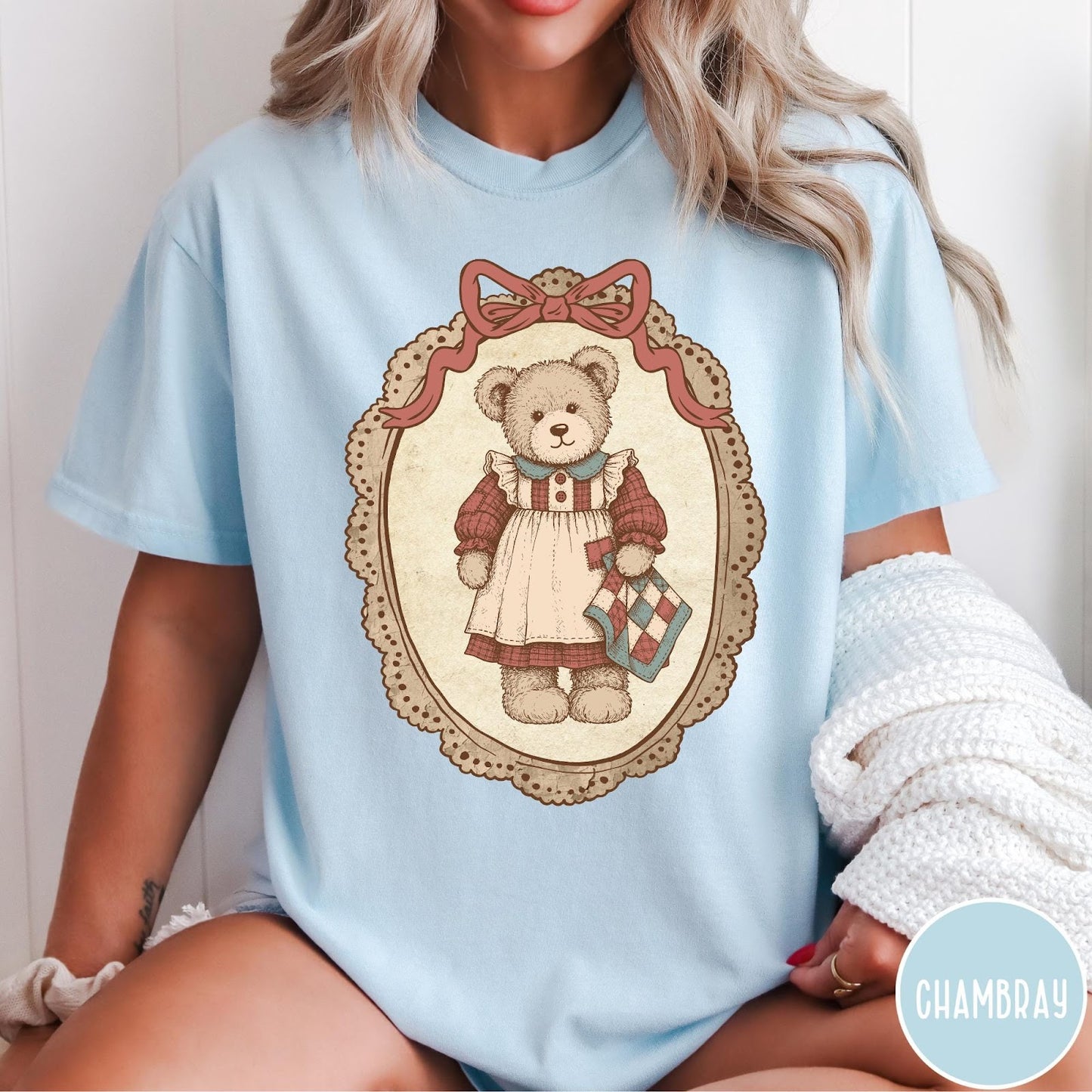 Comfort Colors tee in Chambray featuring vintage style teddy bear graphic inside a decorative lace oval frame