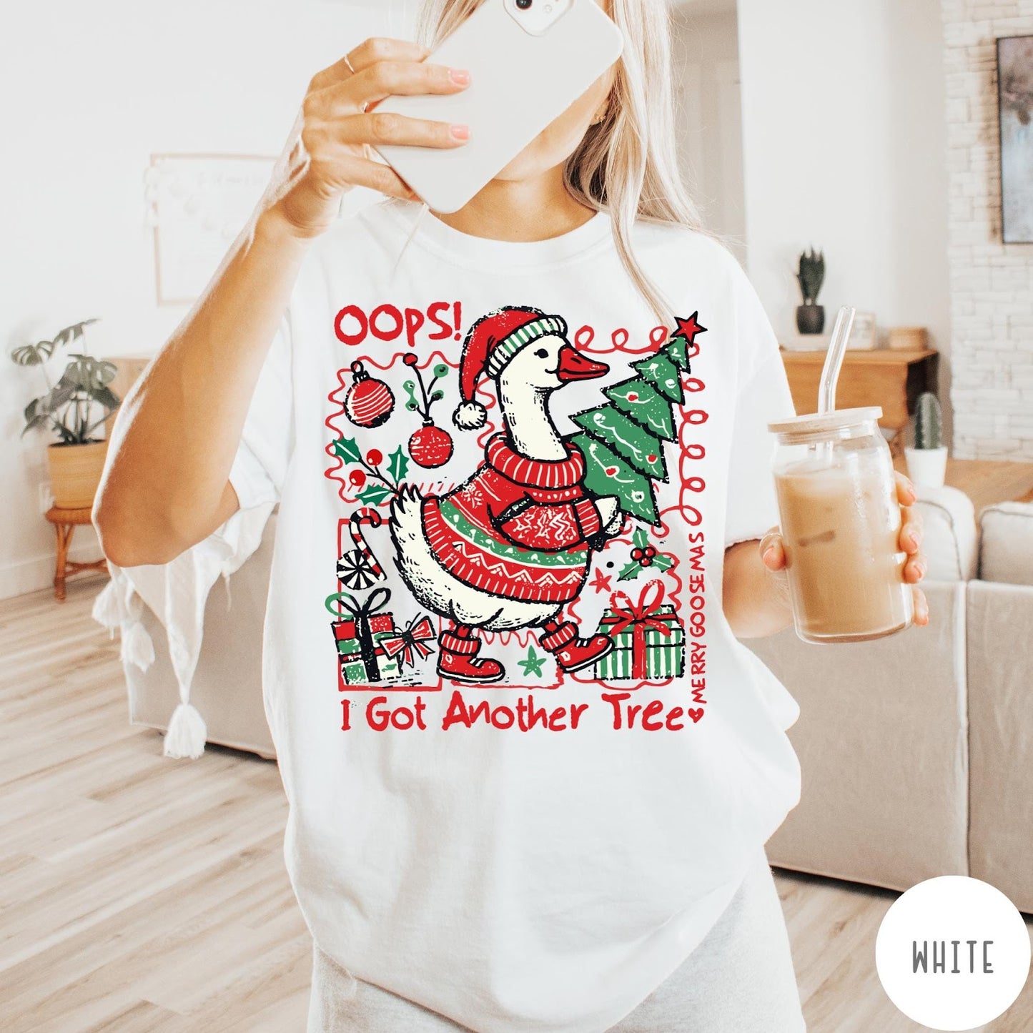 Comfort Colors tee in White featuring festive graphic design of a goose wearing a sweater and hat