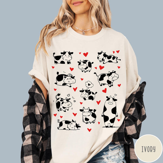 Comfort Colors tee in Ivory featuring cute cow lover graphic with various black and white cow illustrations
