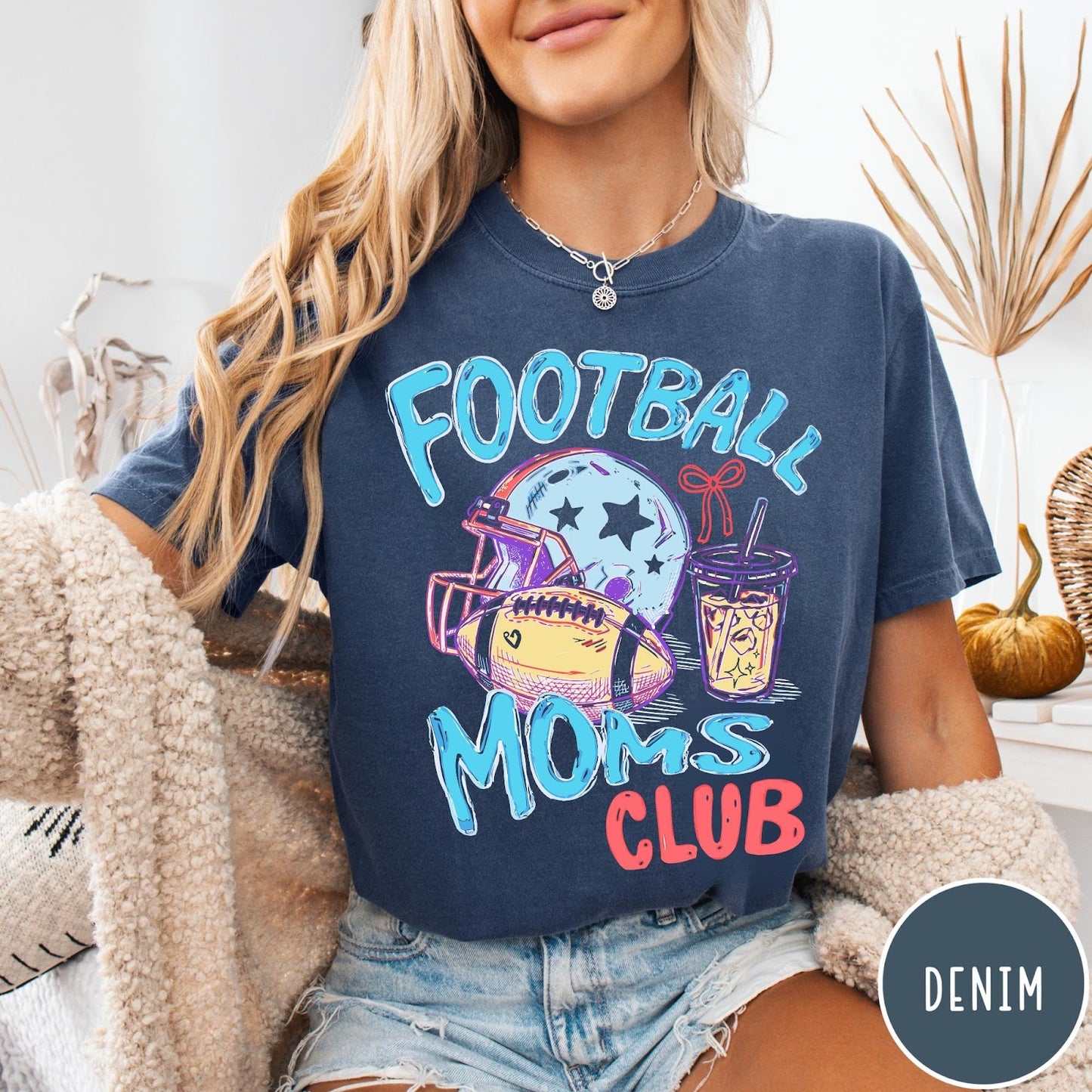 Comfort Colors tee in Denim featuring football lifestyle graphic with helmet, football, and iced coffee drink design