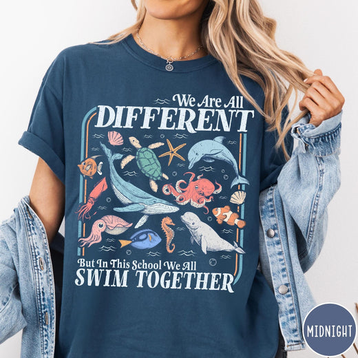Comfort Colors tee in Midnight featuring vintage style graphic with ocean animals including a whale and octopus