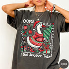 Comfort Colors tee in Pepper featuring festive goose graphic wearing a Santa hat and Christmas sweater holding tree