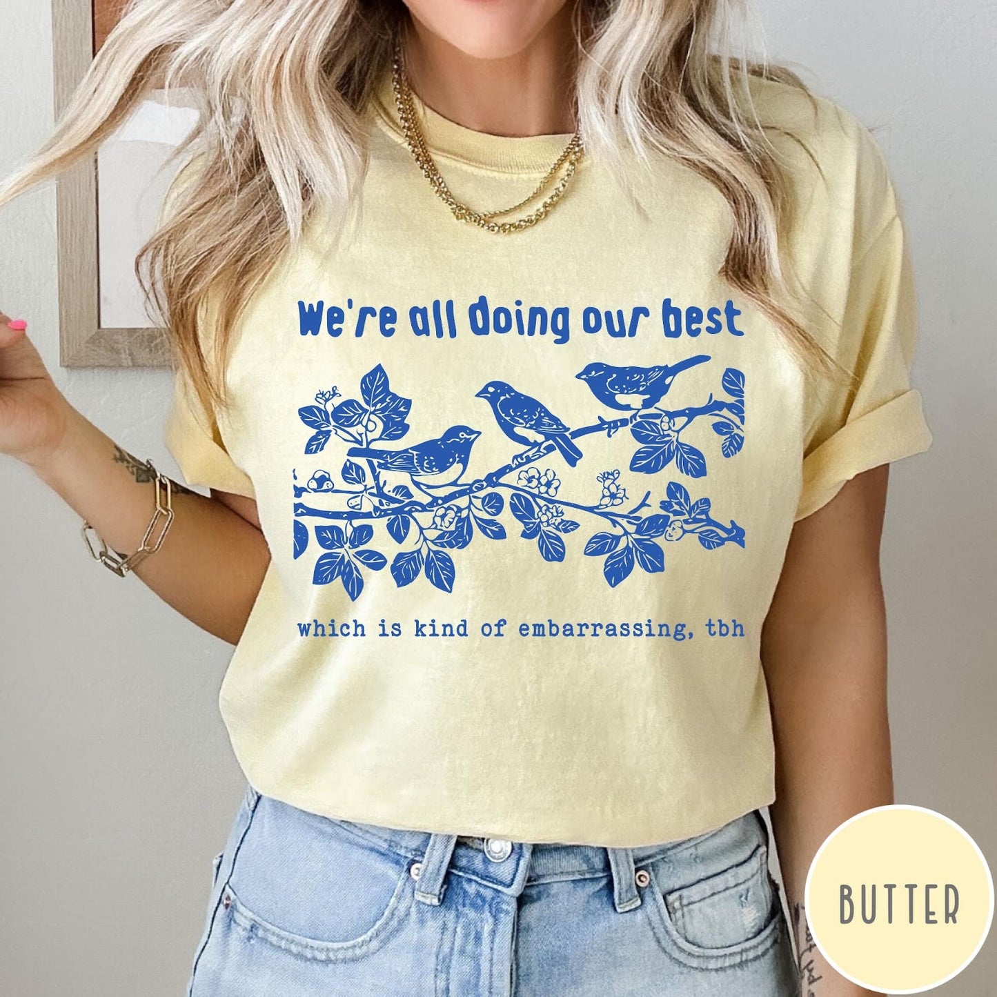 Comfort Colors tee in Butter featuring graphic illustration of birds on a branch with text.