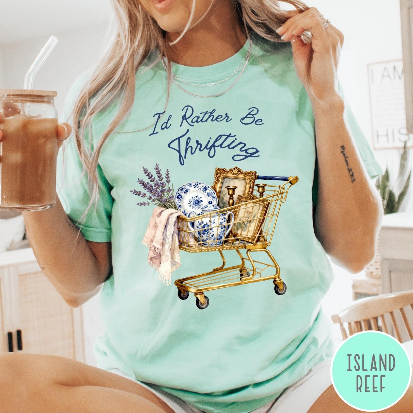 Comfort Colors tee in Island Reef featuring vintage decor graphic of a shopping cart filled with thrifted items