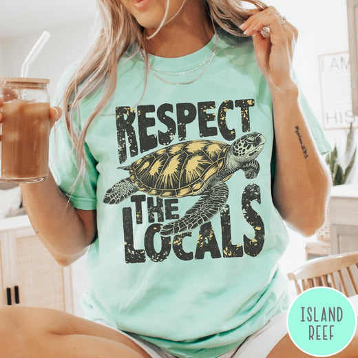 Comfort Colors tee in Island Reef featuring vintage style sea turtle graphic with Respect the Locals text