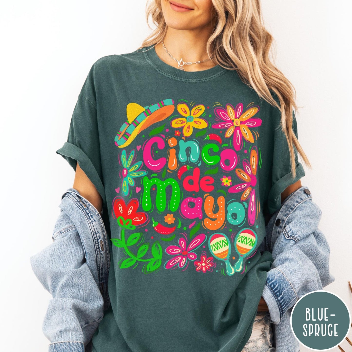 Comfort Colors tee in Blue Spruce featuring festive Cinco de Mayo graphic with sombrero, maracas, and colorful flowers