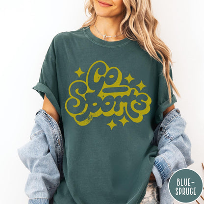 Comfort Colors tee in Blue Spruce featuring retro sports style graphic with Go Sports text and star accents