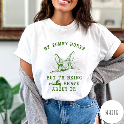 Comfort Colors tee in White featuring line art graphic of a bunny with text My Tummy Hurts