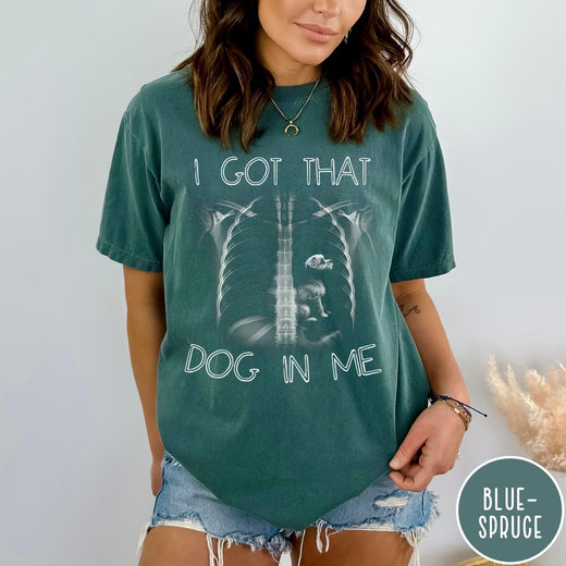 Comfort Colors tee in Blue Spruce featuring graphic style X-ray ribcage with a small dog sitting inside.