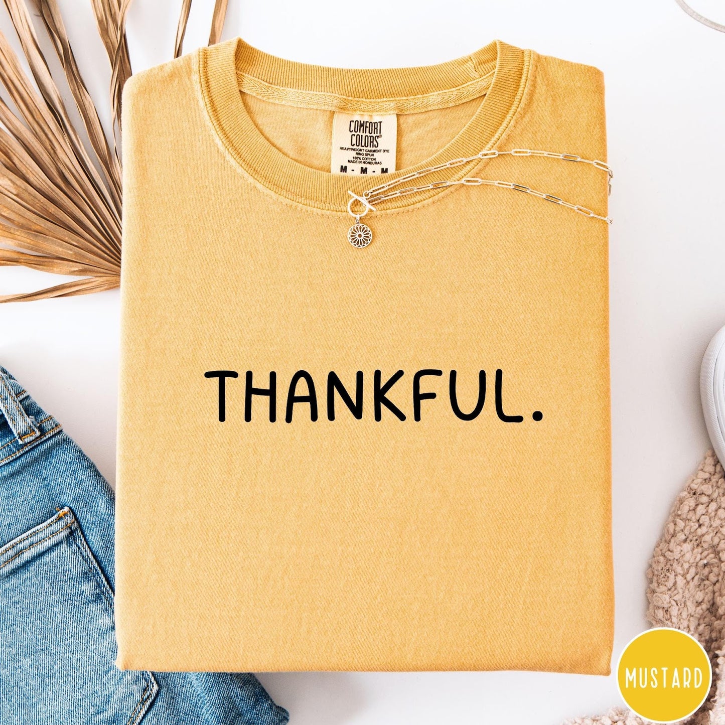 Comfort Colors tee in Mustard featuring minimalist style with the word Thankful printed in black text