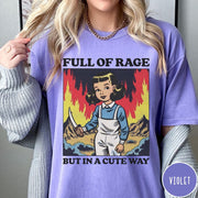 Comfort Colors tee in Violet featuring cartoon style graphic of a girl holding a knife in flames
