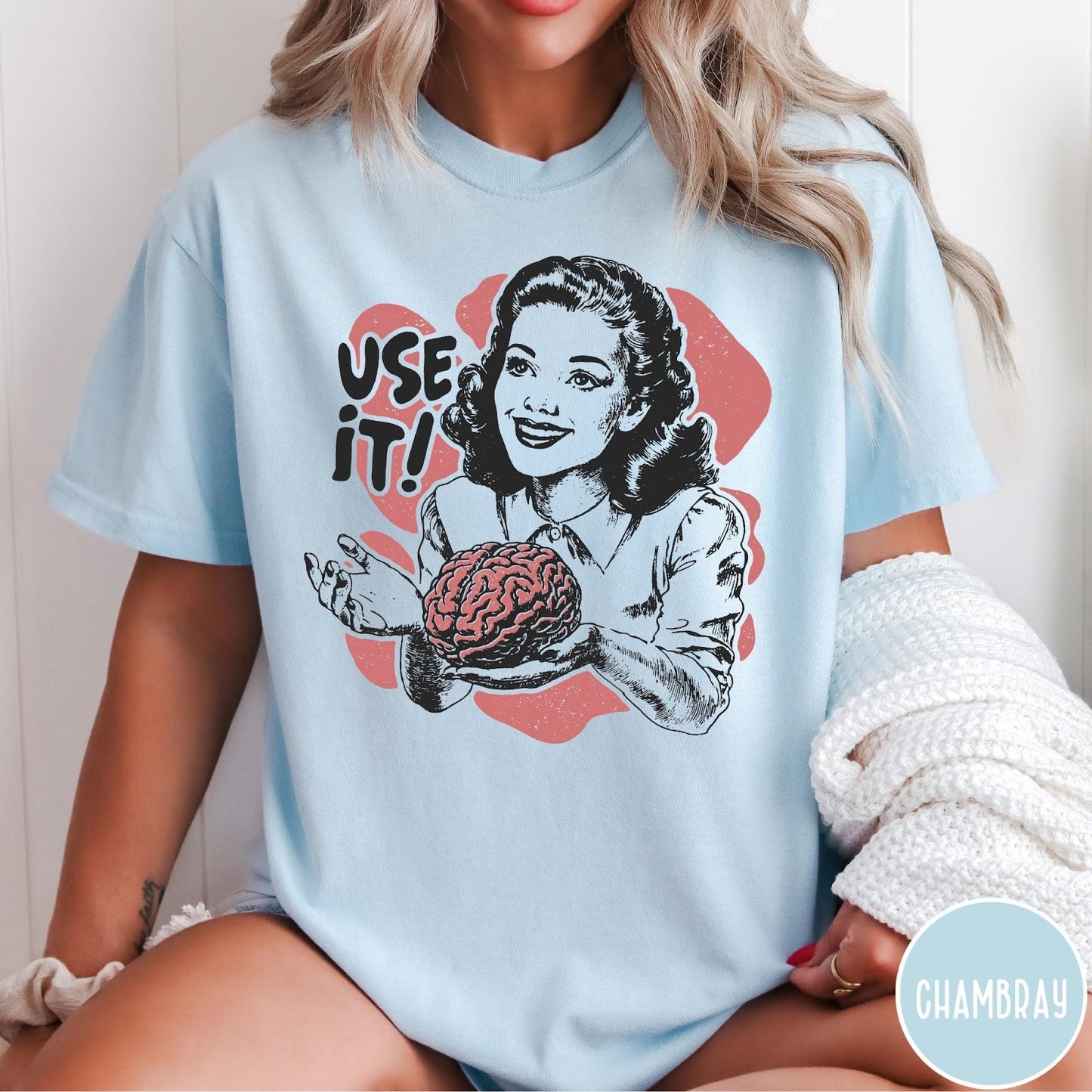 Comfort Colors tee in Chambray featuring retro style graphic of a woman holding a human brain