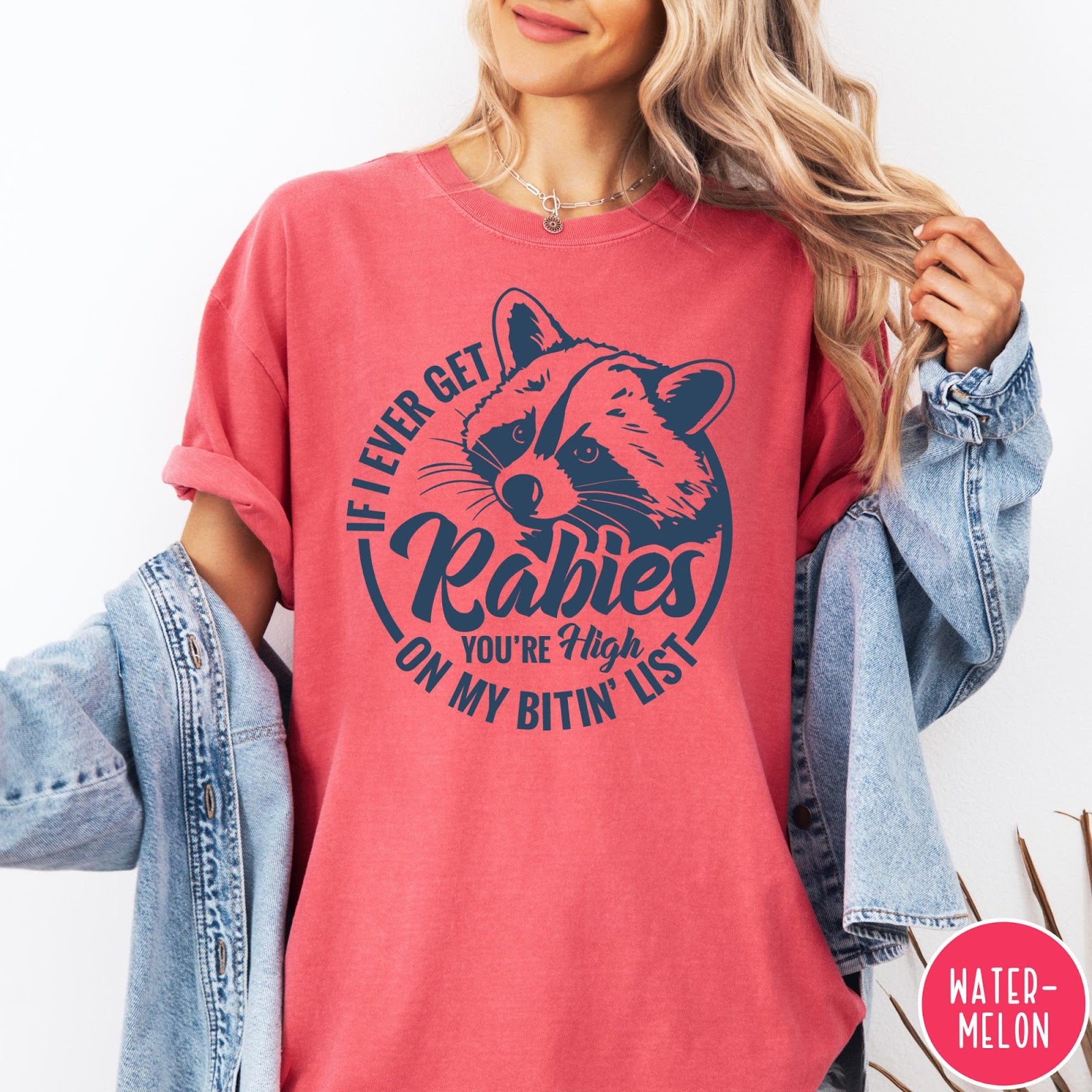 Comfort Colors tee in Watermelon featuring raccoon graphic with text If I Ever Get Rabies You're High On My Bitin' List