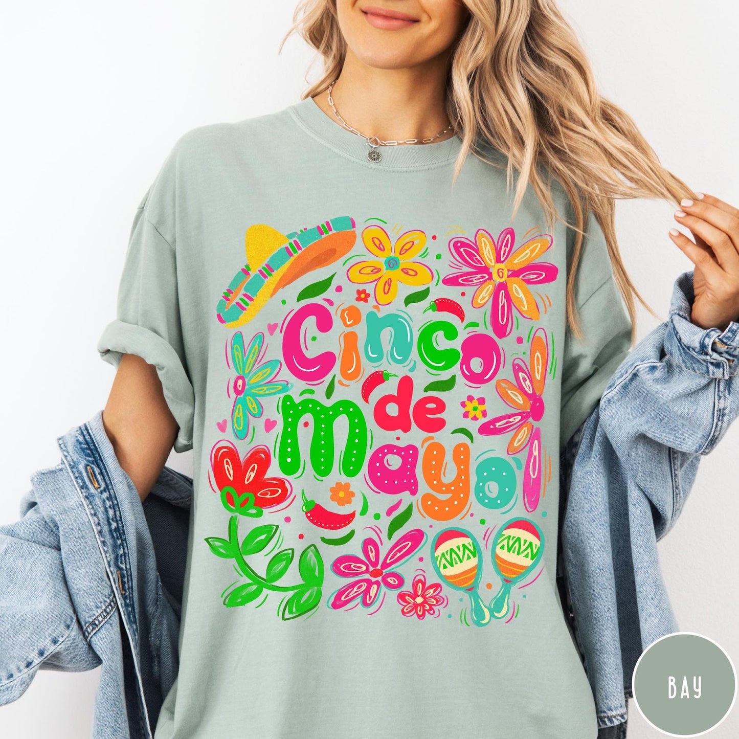 Comfort Colors tee in Bay featuring festive Cinco de Mayo graphic with flowers, sombrero, and maracas