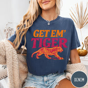 Comfort Colors tee in Denim featuring vintage style graphic with orange text and a walking tiger illustration
